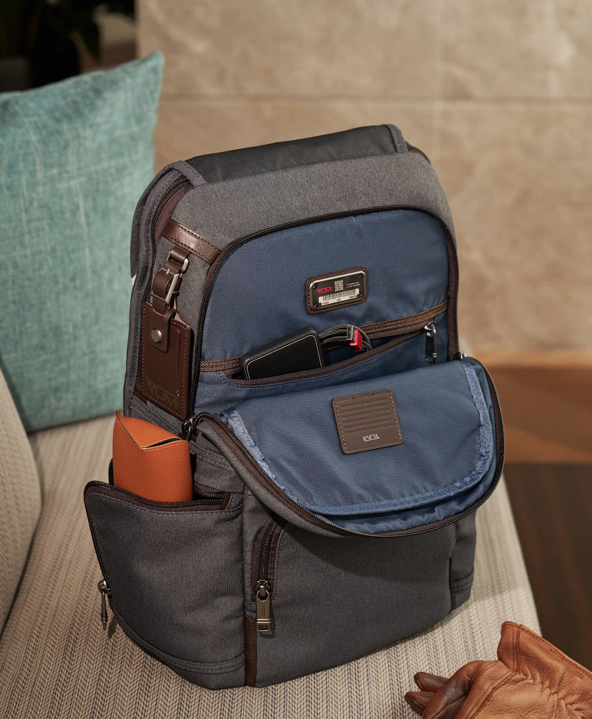 tumi flap backpack