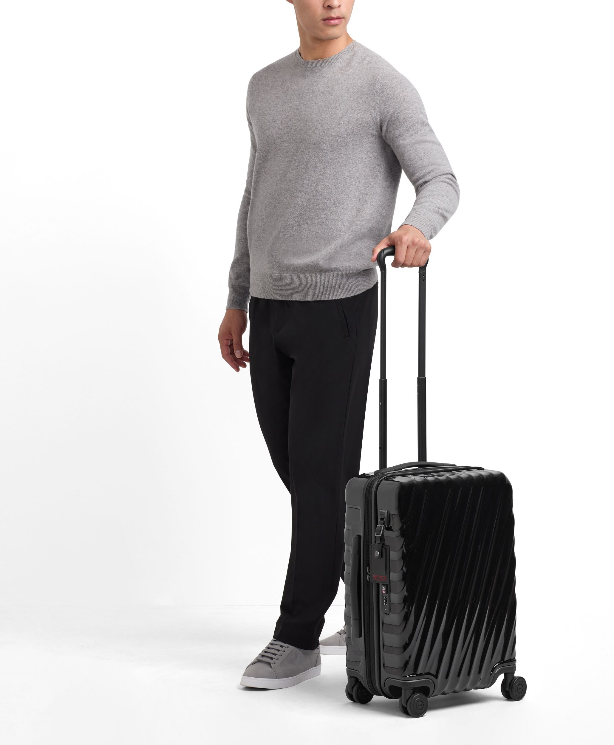 Tumi hard shell best sale luggage